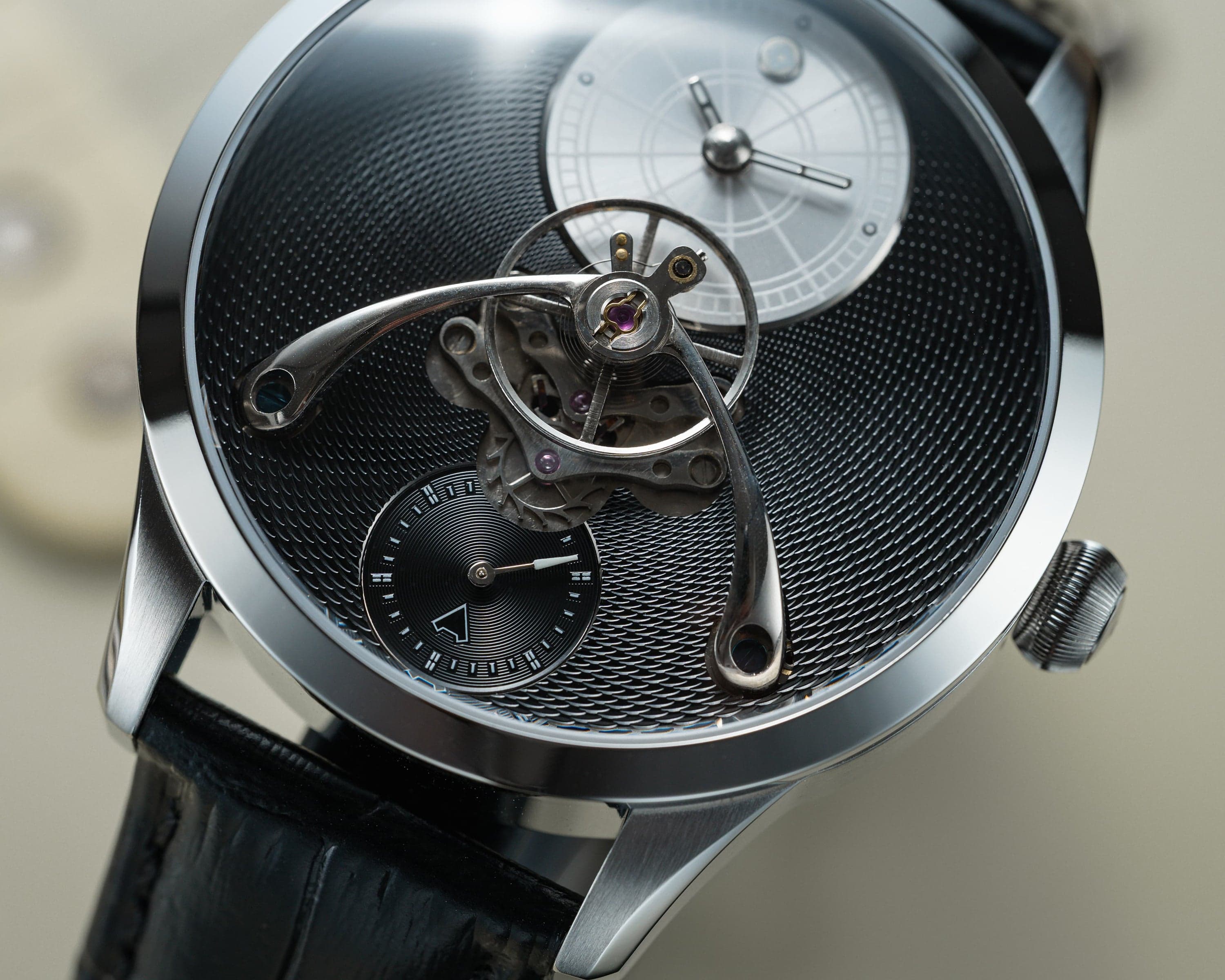 Neoma Star Nero by Black Corner × Omnis — dial close-up, silver chapter ring sub-dial and skeletonised balance bridge over black guilloché
