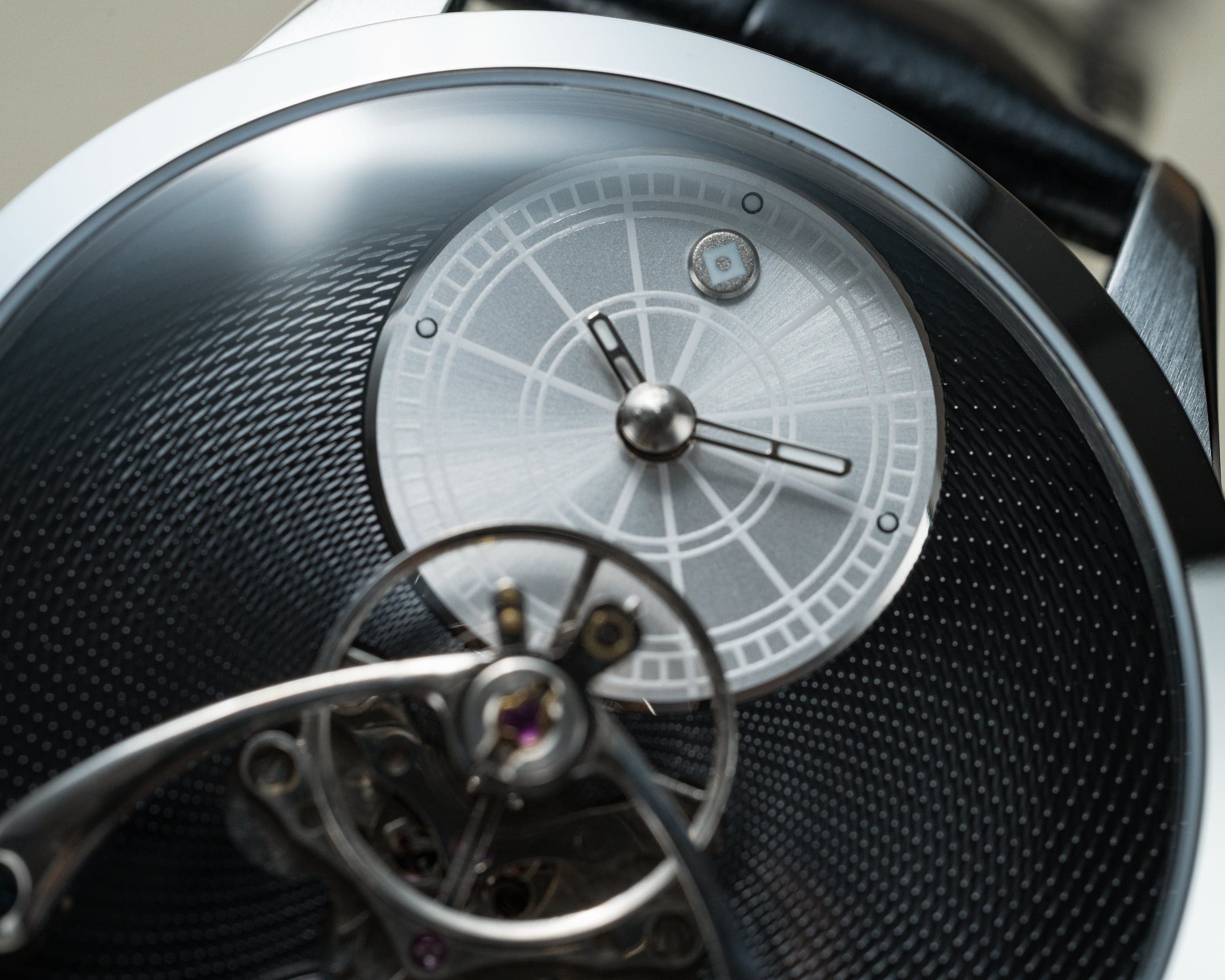 Neoma Star Nero by Black Corner × Omnis — close-up of the engraved silver sub-dial chapter ring and railroad track